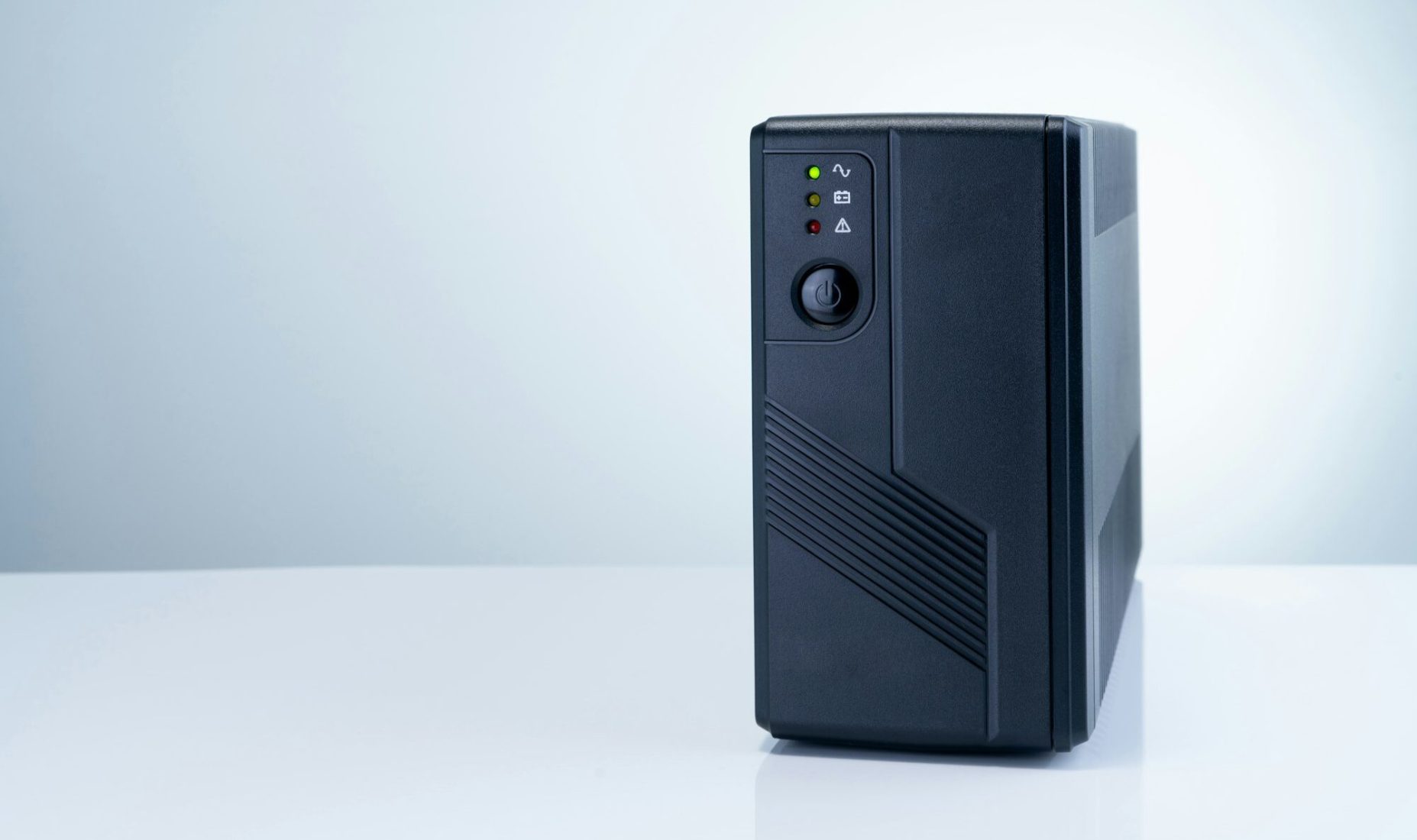 Uninterruptible power supply on white background. Backup Power UPS with battery. UPS with stabilizer